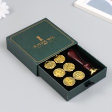 A set of seals for wax with a wooden handle 