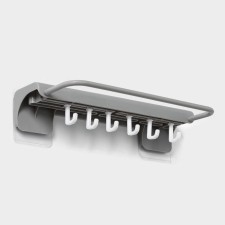 Holder for kitchen accessories with a holder for towels