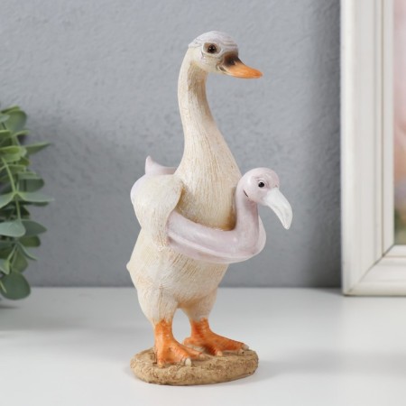 Polystone souvenir "Goose in the inflatable circle - flamingo" 10.5x7.5x16.5 cm-1