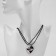 Kuulons "Uzolnutor" on the magnet, swans in the heart, black and white color, 40 cm