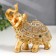 Souvenir Polystone "The Golden Elephant in the rich Popon" 11x5x9 cm