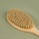 Comb with bristles, 22 × 7 cm, color "light wood"