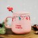 New Year! New Year's Ceramic mug with a spoon "warmth and comfort!", 350 ml, pink color