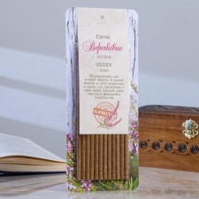 Magic honey candle with heather to attract good luck 