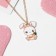 Children's pendant "chosen" bunny with carrots, colored in gold