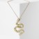Piece "Dragon" wriggling, color gold, l = 46 cm
