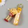 Trick rubber with carbine, strap "Pesik" Hands and Hands stretch 3x4.7x8.8 cm