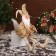 New Year's jester "with wings" sits, moves, 39x14 cm, gold