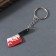 Acryl key a mirror "bloodied test" 4.6x1.6x0.4 cm