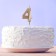 Candle for a cake, number "4", champagne.