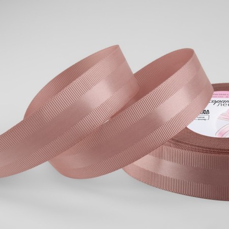 The tape is decorative, repression/satin, 25 mm, 18 ± 1 m, the color of the powder