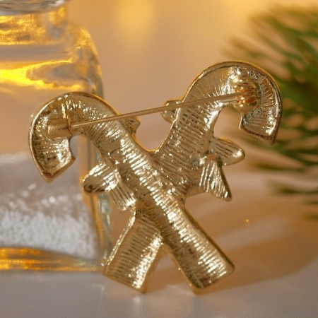Brooch "Lollows" with bows, colored in gold-1
