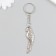 Metal key "parrot" silver 1.6x5.5 cm