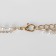 Piece "Chain" thread of pearls, a smooth cross, white color in gold, 35 cm