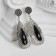 Hanging earrings with rhinestones "drop" motives ethnic, black color in black silver, 7 cm