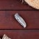 Folding “snake” knife, automatic, curly handle