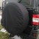 A cover for a spare wheel 33 inches, mix