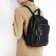 Women's backpack made of artificial leather with lightning, 6 outer pockets, black color