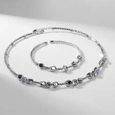 Set 2 objects “necklaces, bracelet” noel figure, white color in silver