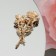 Brooch "Flowers" bouquet, lilac color in gold