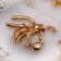 Brooch "Bee" with bead, color in gold