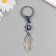 Keychain from the evil eye Metal "leaf" 2.2x7.5 cm