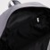 A backpack with a zipper, an outer pocket, 2 lateral pockets, a wallet, color gray color