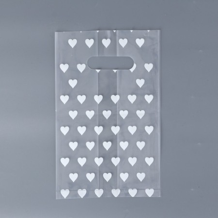 Polyethylene square package with a cut handle, packaging, "hearts", 25x35+16cm ± 5% 60 μm