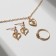 Set 3 objects: earrings, pendant, ring, size mix (16-18) “heart”, white color in gold, 40 cm