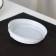 A plastic disposable lid for a white glass, with a valve, d = 8 cm