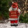 Santa Claus "Colored fur coat and with a flashlight on the staff" 30 cm, moves, red-gray