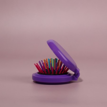 The comb is massage, folding, with a mirror, d = 6 cm, color mix-9