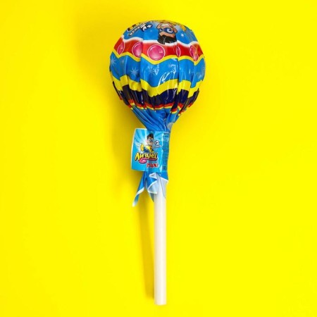 Caramel "Lizunets" on a stick with a chewing elastic band, for boys, 125 g