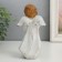 Souvenir Polystone "Angel in beige toga with a heart" 6x8.5x16 cm