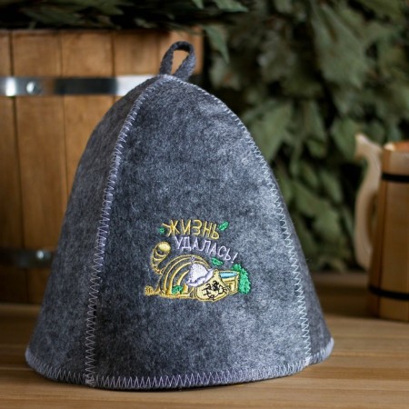 A hat for a bathhouse with embroidery from a gray felt "Life was a success!"
