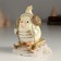 Polystone souvenir "Tick with a crest, in headphones" 9x8x11 cm