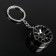 Cartage keychain, disk, metal, dark chrome
