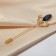 Lilia Royal pin 7.6cm, white-blue color in matte gold