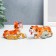Polystone souvenir "Blue -eyed tiger with coins/bills" MIX 4x4x10 cm