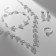 Set 4 objects: earrings, necklaces, bracelet, skewers ring triliary, white color in silver