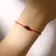 Bracelet of desires "tourmaline" on a red thread, the length is regulated