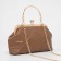 Clamp bag on the farmar, brown color