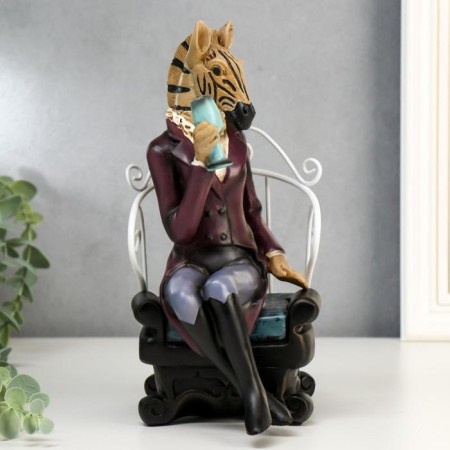 Polystone souvenir "Zebra with a glass in an armchair" 25x12x15 cm