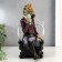 Polystone souvenir "Zebra with a glass in an armchair" 25x12x15 cm