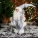 Santa Claus "with a Christmas tree and with a staff with a bow" 33 cm, silver