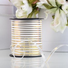 The tape is packaging, white with a gold stripe, 5 mm x 225 m