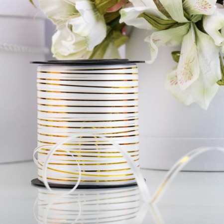 The tape is packaging, white with a gold stripe, 5 mm x 225 m