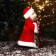Santa Claus "with a decorated staff and bag" moves, with backlight, 30x16 cm, red
