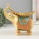 Polystone souvenir "Beige elephant with a gold leaf on the back" 19.3x11x19 cm
