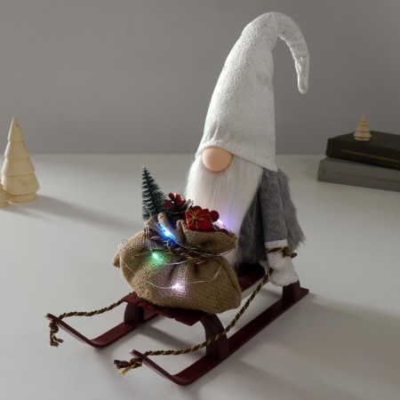 Interior light doll "Dwarf in a shiny cap with a bag of gifts on sleds" 10x26x41 cm